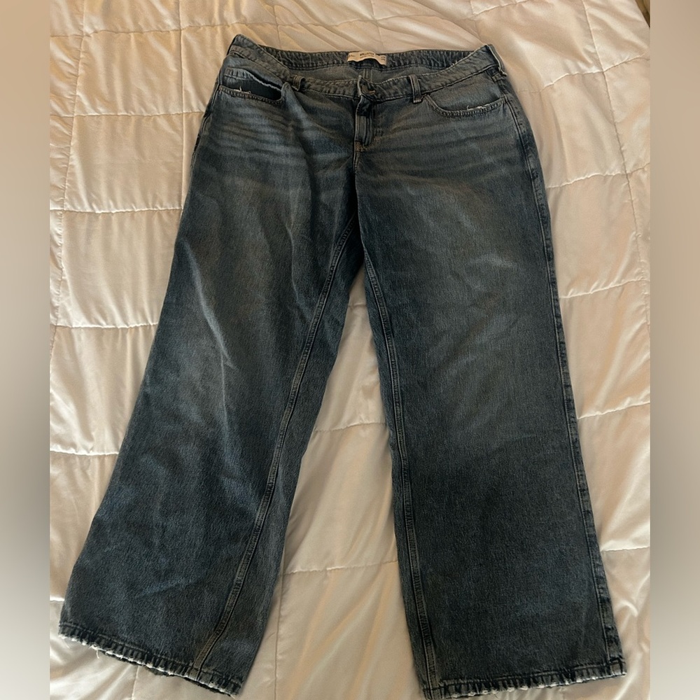 Woman’s medium wash low rise Hollister jeans Size 16